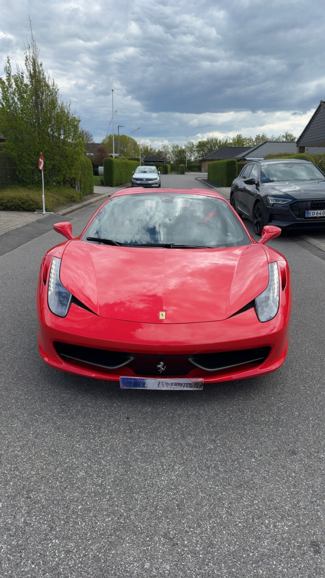 Rød Ferrari efter udvendig vask og coating hos MH Detailing